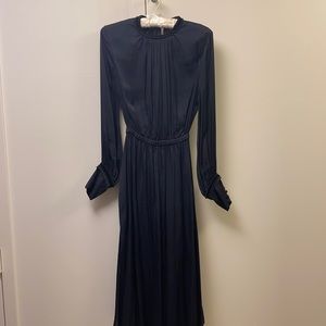 Black silky dress with open back